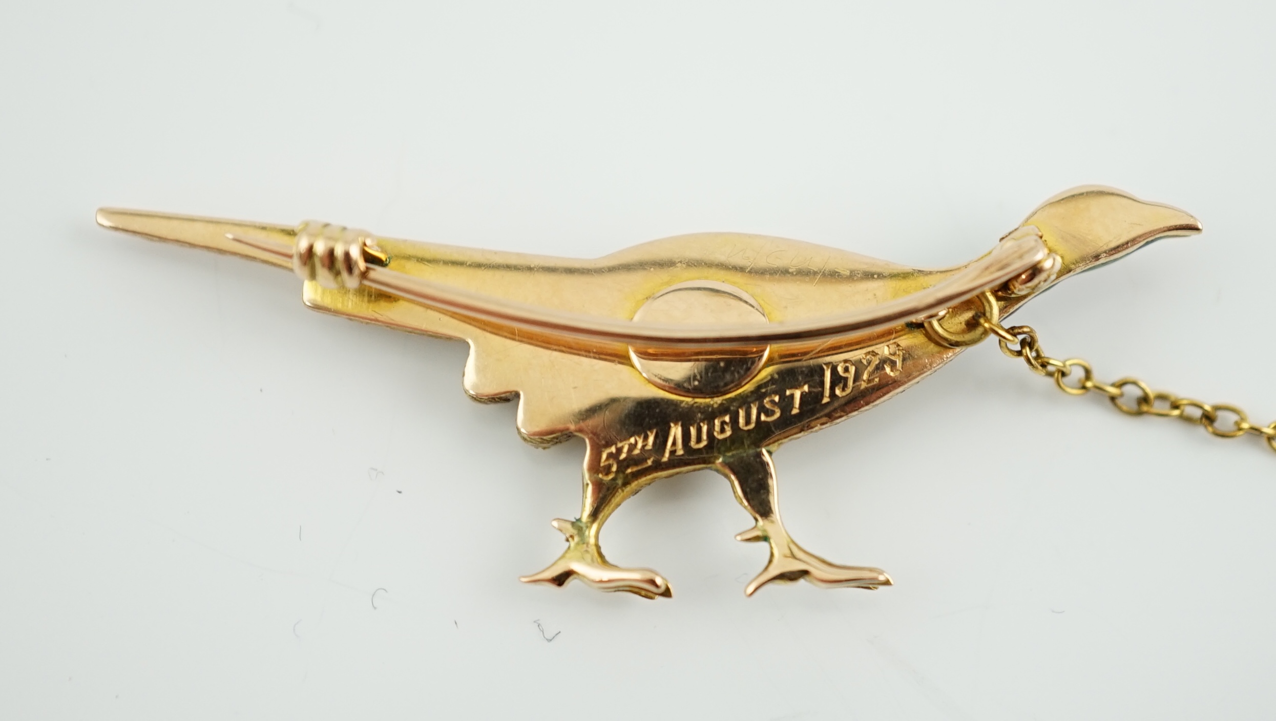 A George V three colour gold and enamelled pheasant brooch